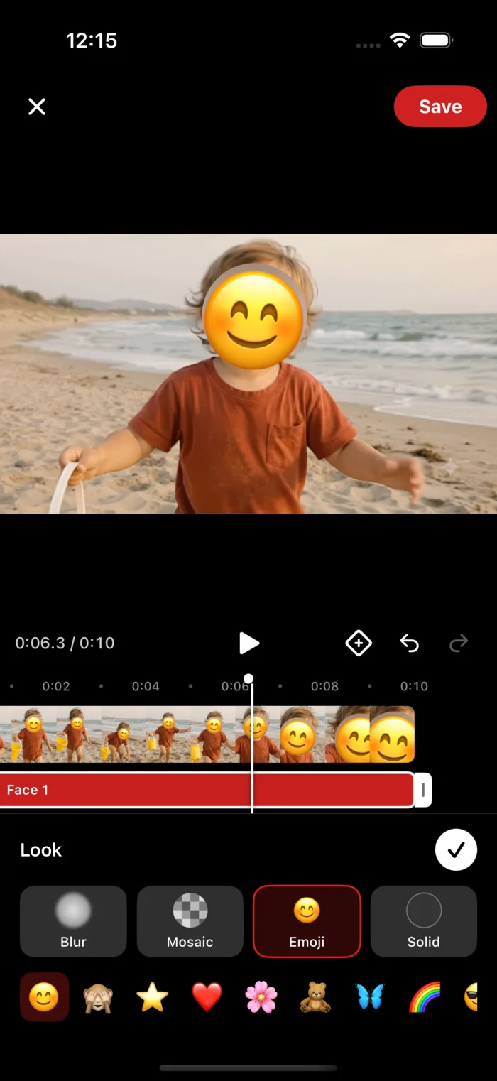 Blur Kids editor on iPhone with an emoji covering a toddler's face and the look picker open